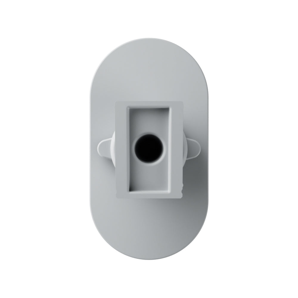 Gray plastic component with a central hole on a white background